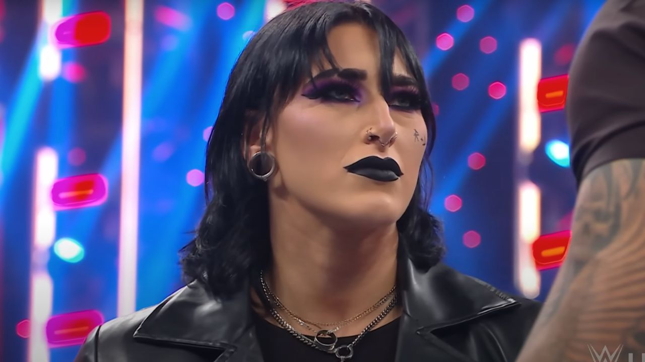 "Rhea Ripley's Tattoo Chronicles: WWE's Intimidating Force Flaunts Mysterious Ink, Fans Speculate its Symbolic Significance"